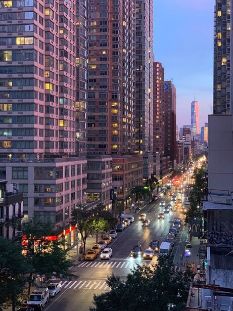 an iPhone photo of a downtown twilight scene