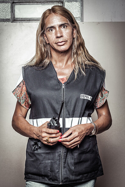 A female guard inside a prison.