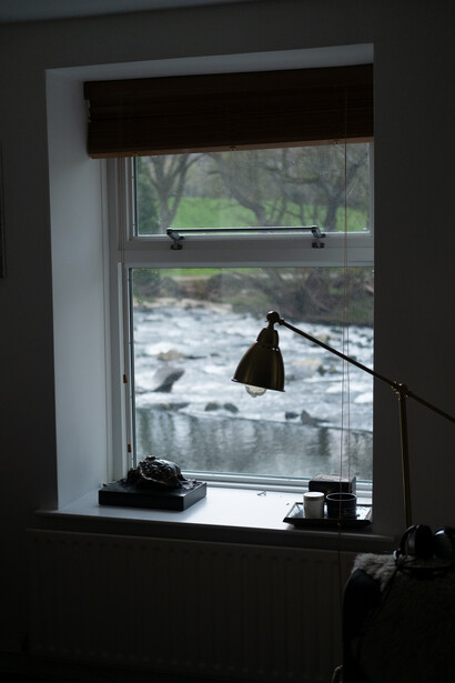 A window facing a river