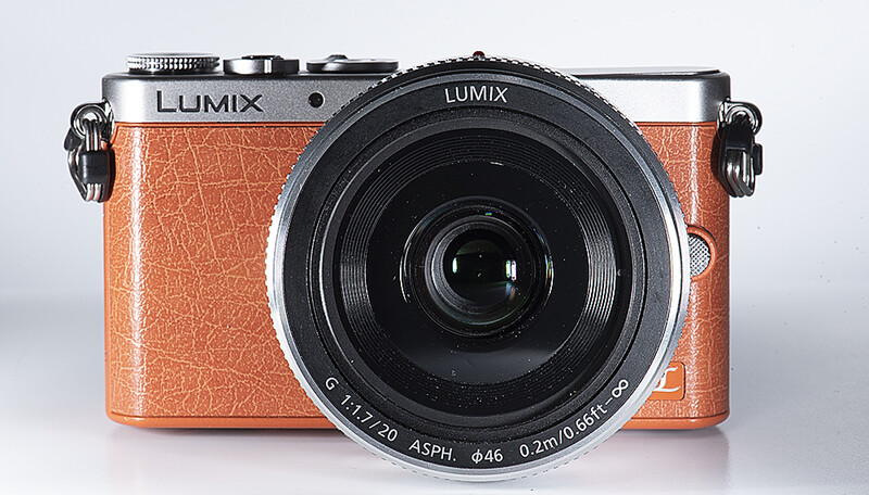 Panasonic shoehorned a Micro Four Thirds sensor into a camera the size of a deck of cards. This is smaller than many 1-inch sensor point-and-shoots, and it still gets better image quality and more features.