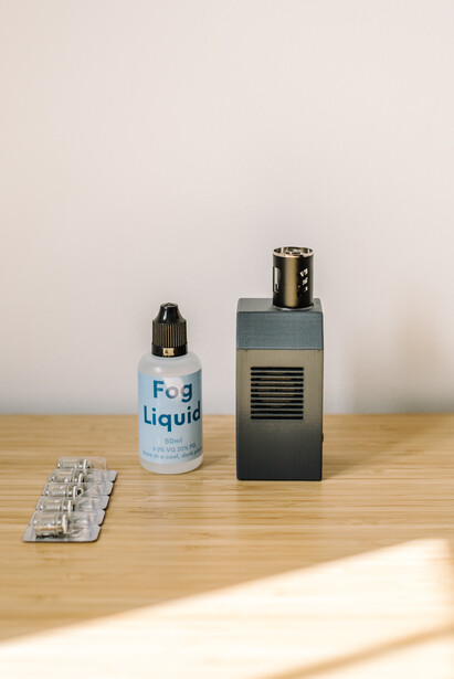 Microfogger 2 and its accessories on a table