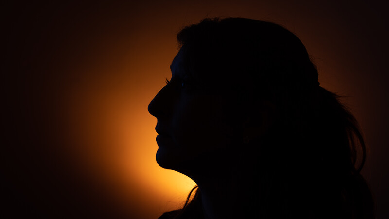 Headshot silhouette from back light