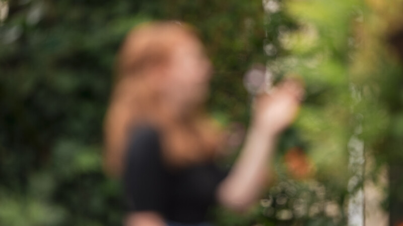 Out of focus portrait of woman