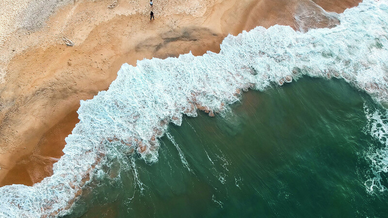 Aerial photo of beach and waves
