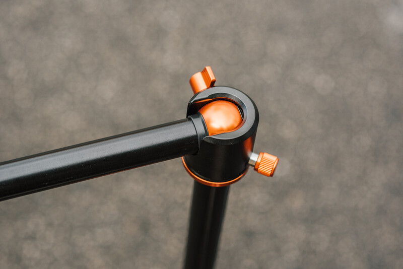 Close up of a tripod center column.