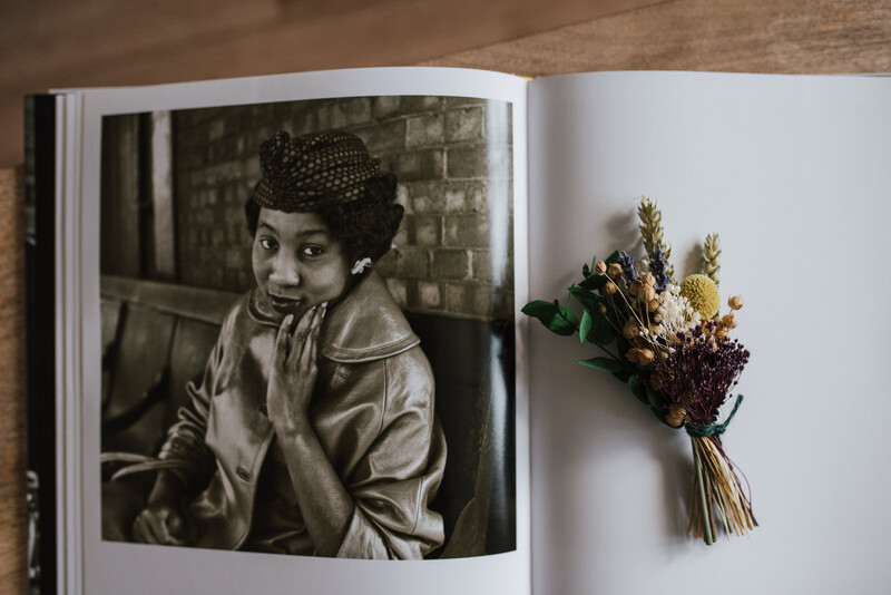 A photography book on a coffee table.