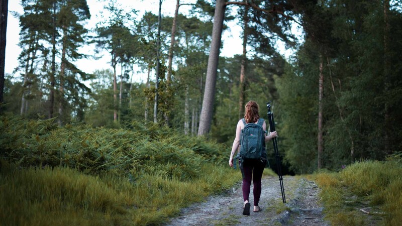 Woman carrying camera bag