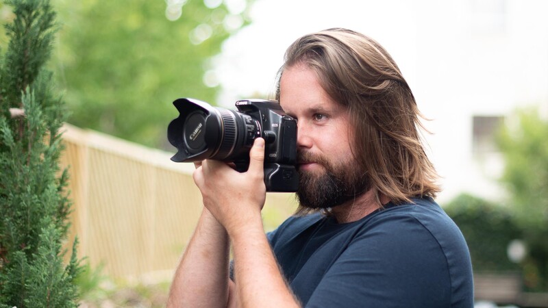 Man shooting with Canon