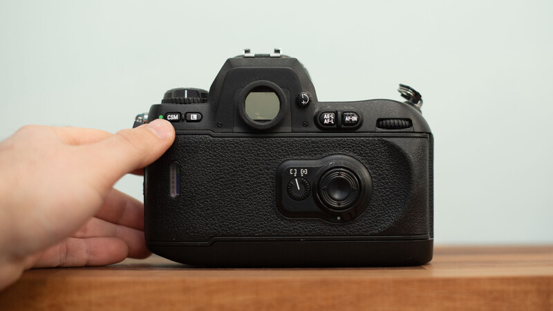 Rear of film camera Nikon F100