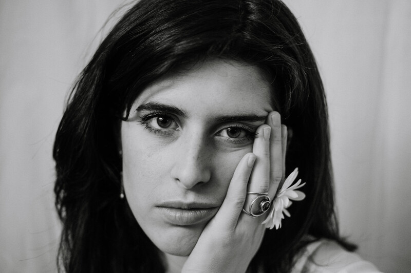 A young dark haired woman's portrait