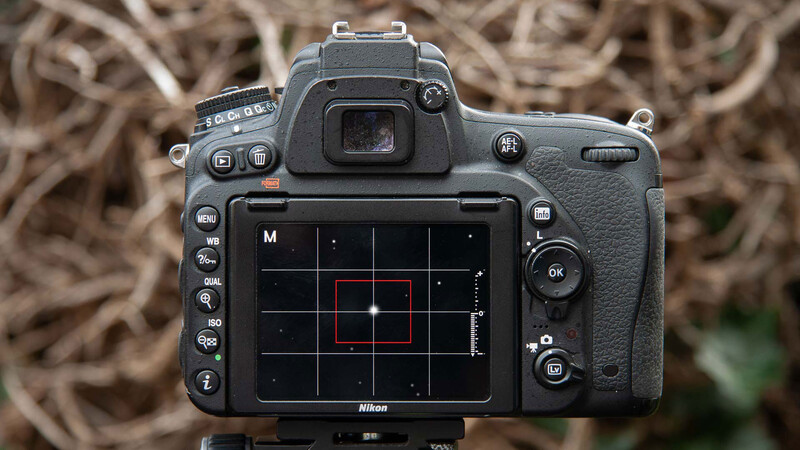Spin the focus ring on the lens