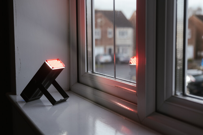 Smartphone flash light with a red gel