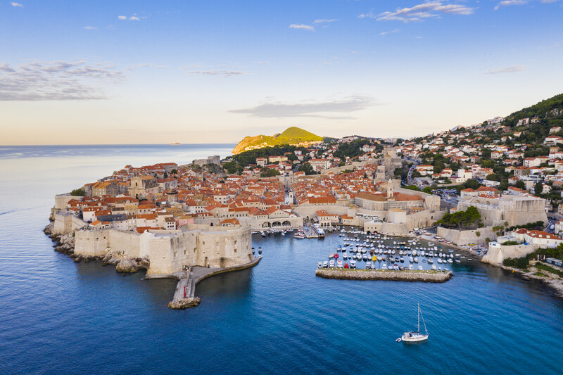 An island coast and a village.