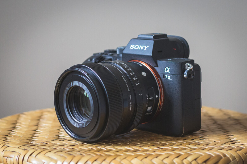 Sigma 65mm f/2 DG DN attached to Sony a7 III