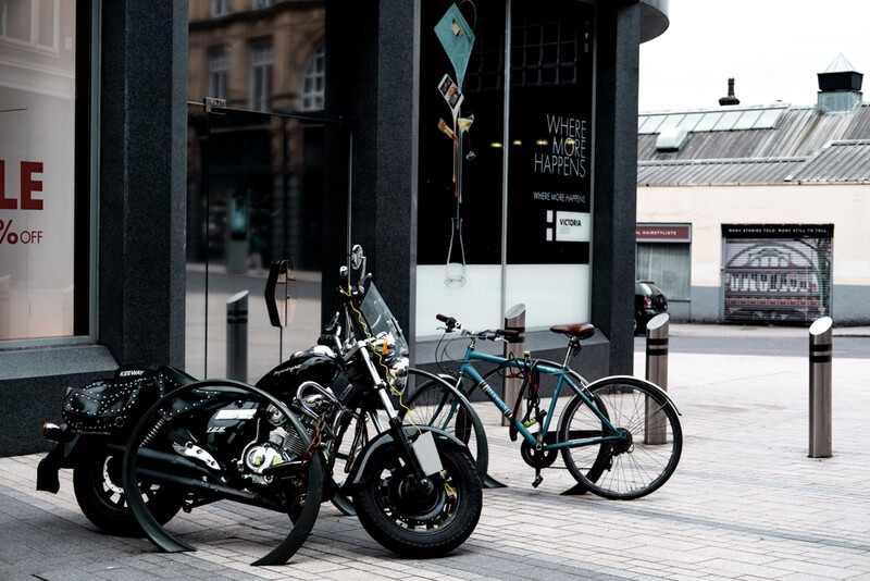 A parked up motorcycle on the street