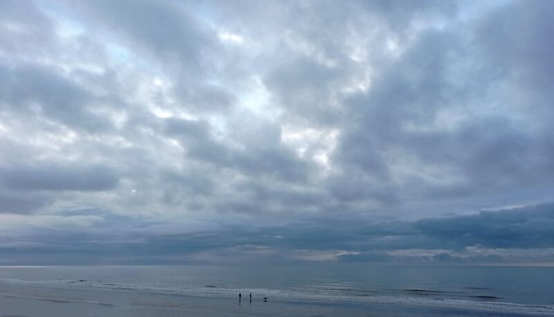 © Ivor Rackham The contrasts here are the tiny figures against the enormous sky and sea, plus their hard, dark forms against the soft and fluid mid-tones of the environment.