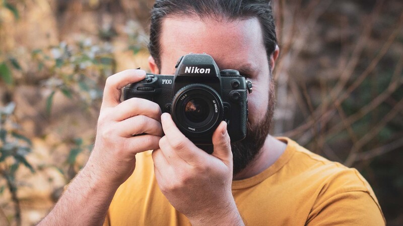 Man with film camera