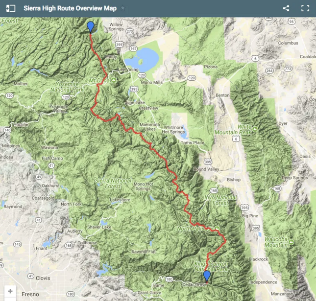 Screenshot of a hiking route map showing a red trail line running through mountainous terrain with green vegetation and blue lakes.