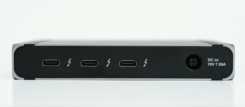 Rear panel of a docking station with three USB-C ports, power indicators, and DC input jack rated 19V 7.89A.