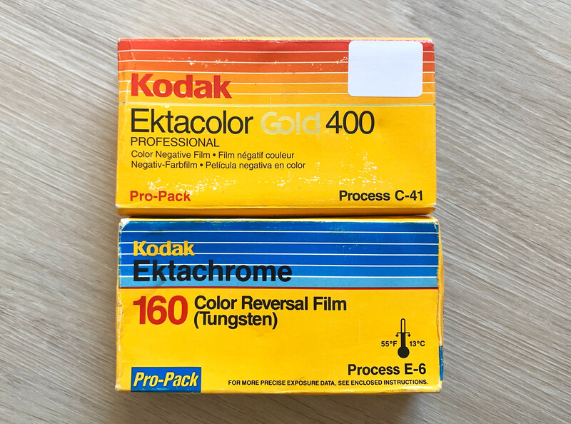 Two vintage Kodak film boxes stacked together: Ektacolor Gold 400 and Ektachrome 160 color reversal film.