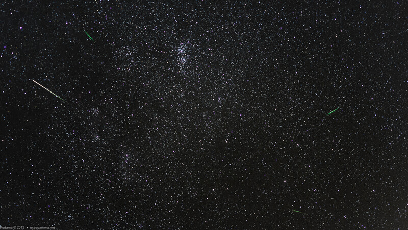 Milky Way galaxy stretching across a starry night sky with multiple meteor streaks visible.