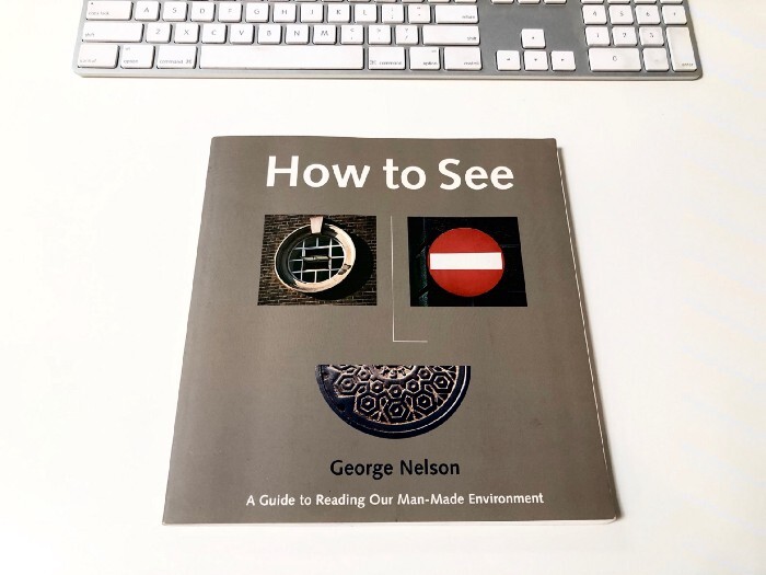 Book cover titled "How to See" by George Nelson with a globe icon, Austrian flag, and decorative geometric symbol.