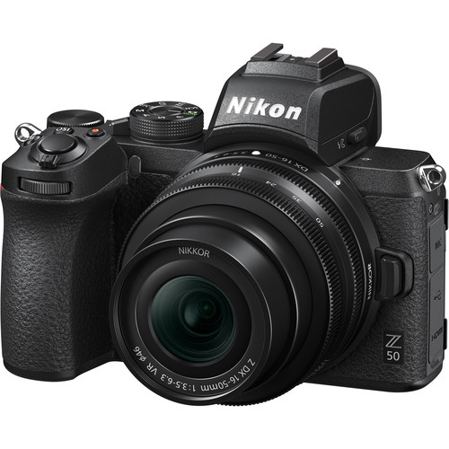 Nikon Z50 mirrorless camera with 16-50mm lens mounted, shown at three-quarter angle against white background.