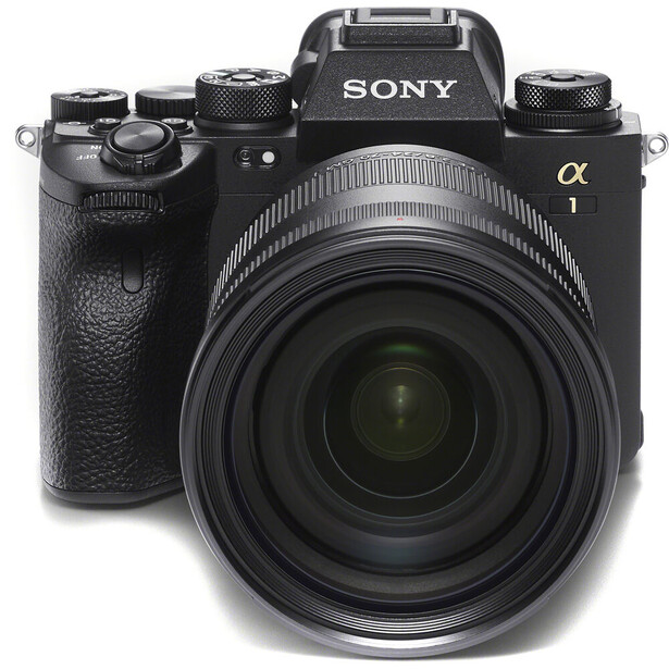 Sony Alpha mirrorless camera with attached zoom lens, viewed from front against white background.