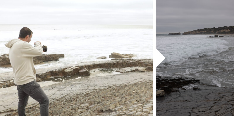 Photographer shooting seascape with rocky coastline and waves from beach.