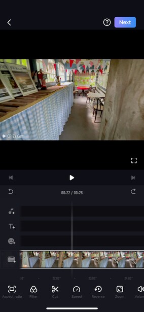 Screenshot of video editing software with timeline and color-graded footage of an interior space.