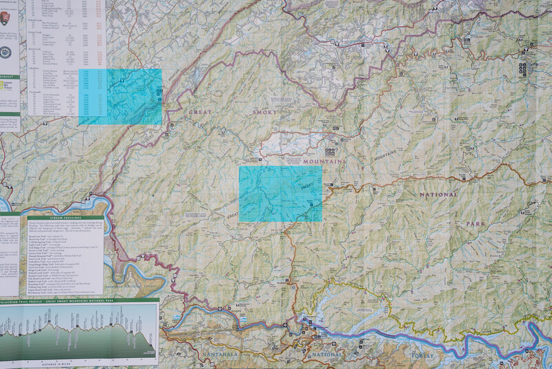 Topographic map with two cyan-colored rectangular overlays marking specific regions.