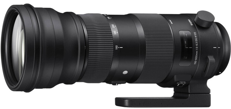 Black telephoto lens with focus ring and tripod collar mount against white background.