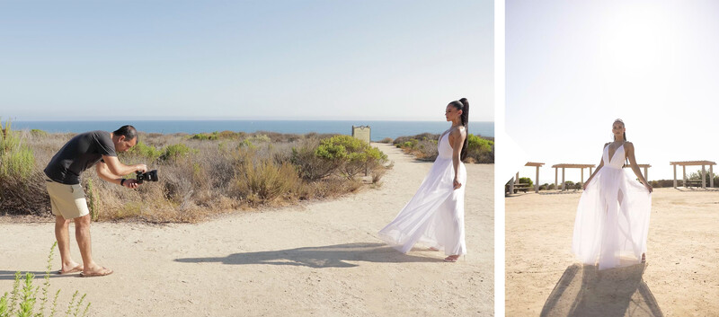 Photographer shooting a bride in a white dress on a sandy beach with ocean backdrop.