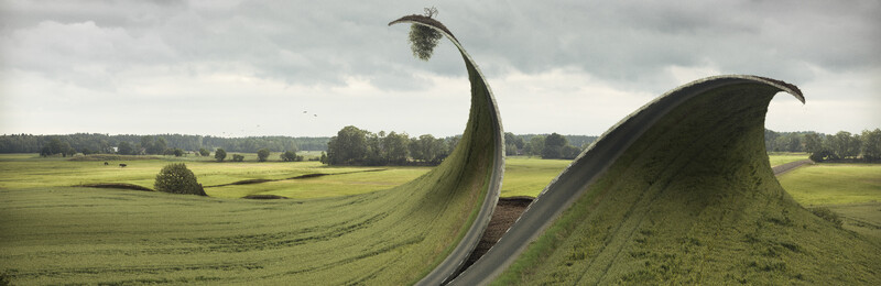 Surreal image of a road curving upward into the sky above a pastoral landscape.