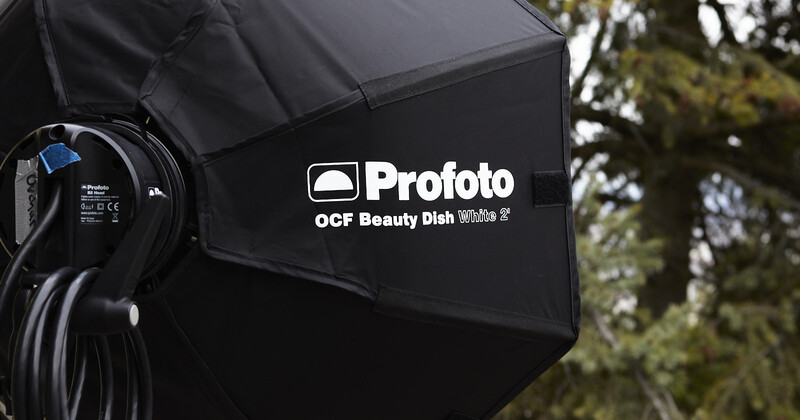 Profoto OCF Beauty Dish White XL softbox attached to studio lighting equipment outdoors.
