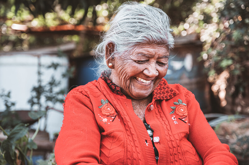 A lady smiles in Mauritius