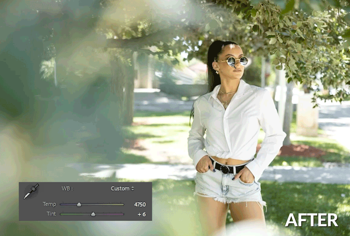 Woman in white shirt and denim shorts standing outdoors among trees with editing panel visible.
