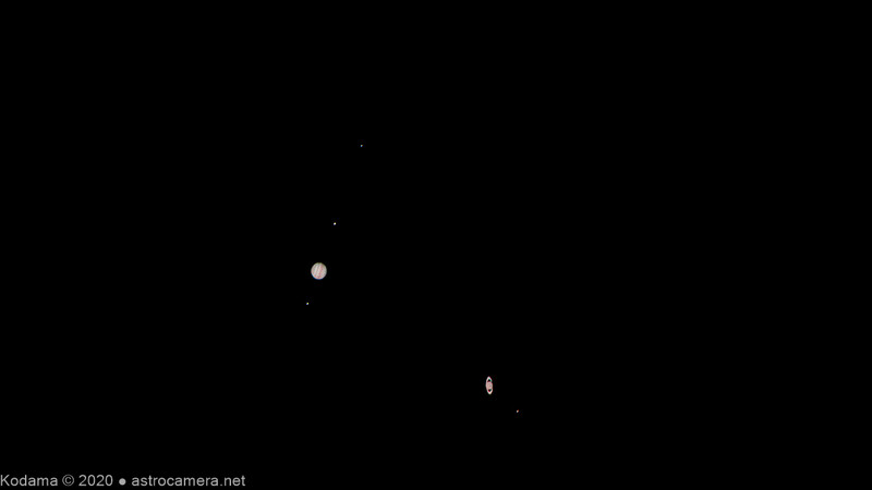 Moon and Jupiter captured together in a dark night sky during close celestial alignment.