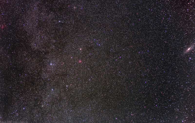 Milky Way stretching diagonally across a starfield with nebulosity and dust lanes visible.