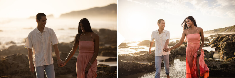 Two couples holding hands on rocky beach at golden hour with coastal landscape behind them.
