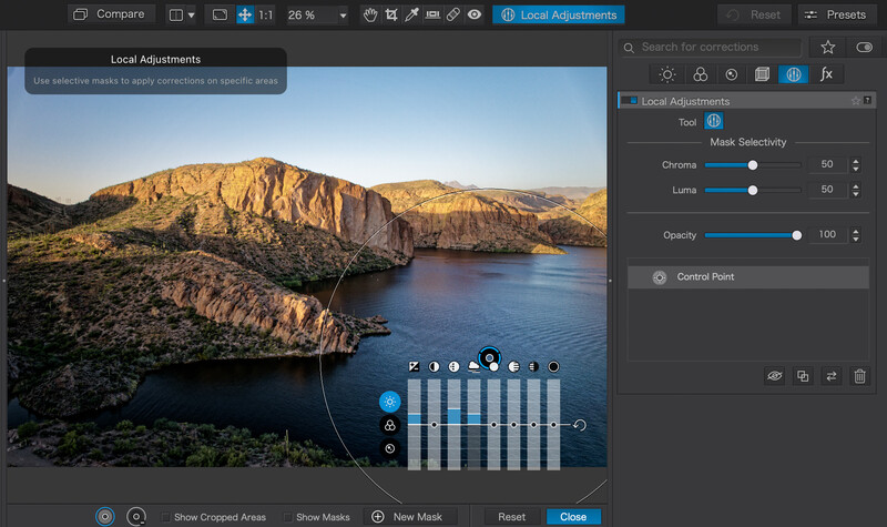 Screenshot of Local Adjustments panel in photo editing software showing a coastal landscape with rocky cliffs and blue water.