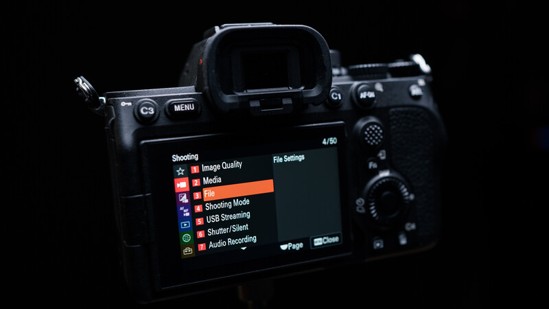 Screenshot of a camera menu displaying shooting settings and file options on an LCD screen.