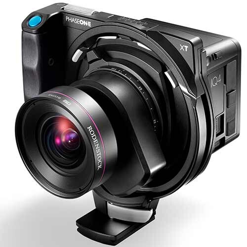 Hasselblad XT mirrorless camera with wide-angle lens mounted on tripod head.