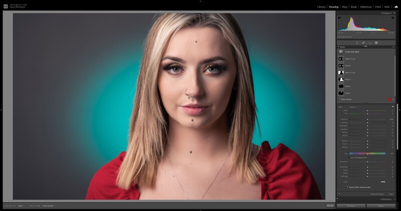 Portrait of woman with blonde hair wearing red against teal and gray gradient background.