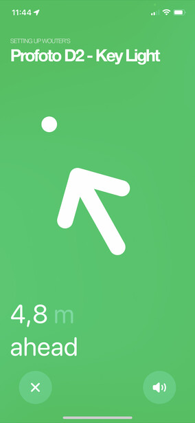 Screenshot of Profoto D2 Key Light app showing navigation arrow icon and distance measurement of 4.8 meters ahead.