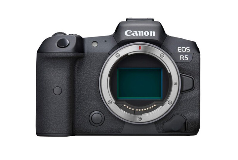Canon EOS R5 mirrorless camera body front view with mounted RF lens.
