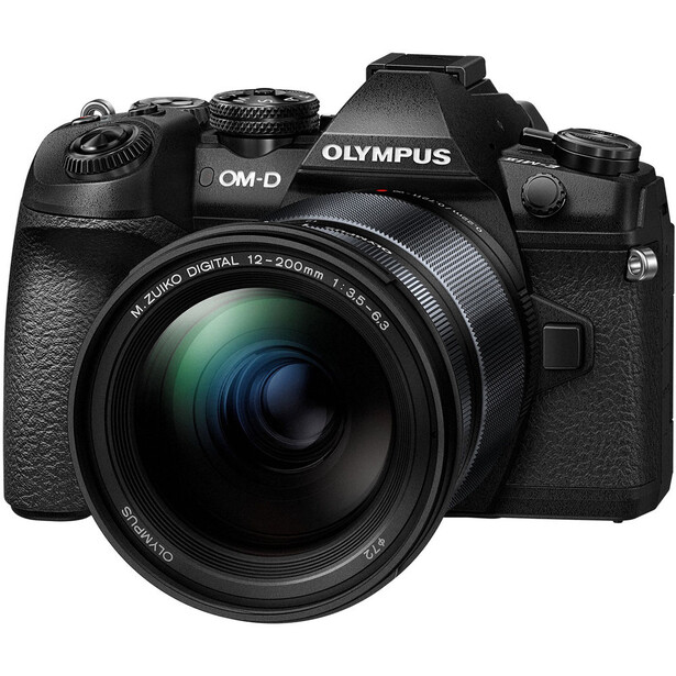 Olympus OM-D mirrorless camera with attached M.Zuiko 12-200mm zoom lens against white background.