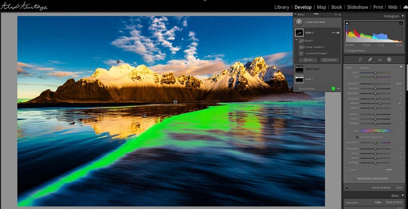 Screenshot of photo editing software showing a landscape image with a bright green selection overlay on water.