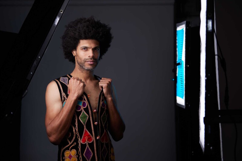 A half-length portrait of Wayne with three lights