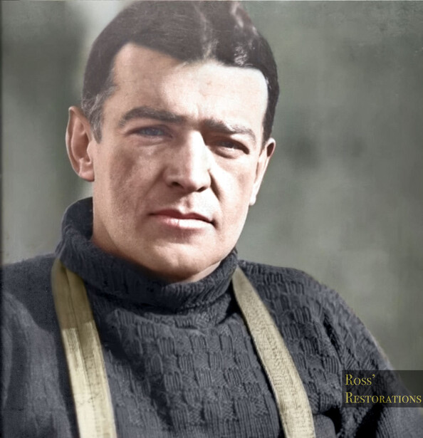 Colorized portrait of a man wearing a dark turtleneck sweater and light scarf, looking directly at camera.